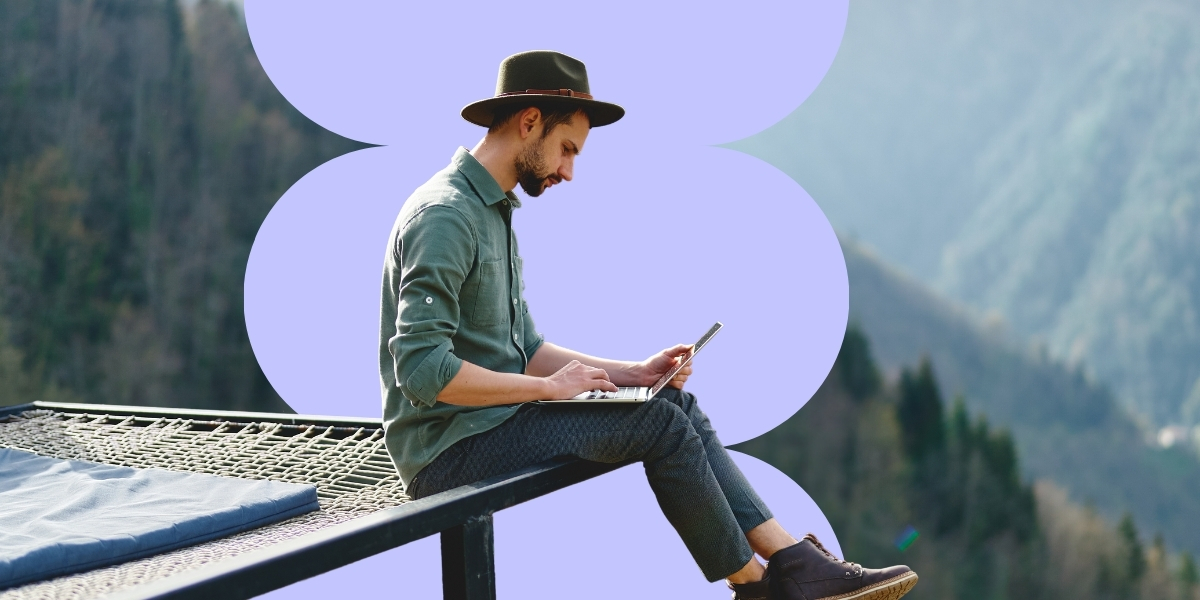 The main image representing a man sitting with a laptop on his lap