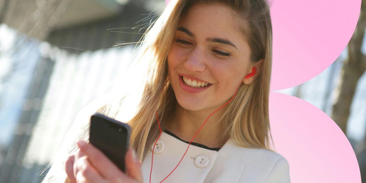 The main image presenting a girl holding a smartphone and wearing headphones
