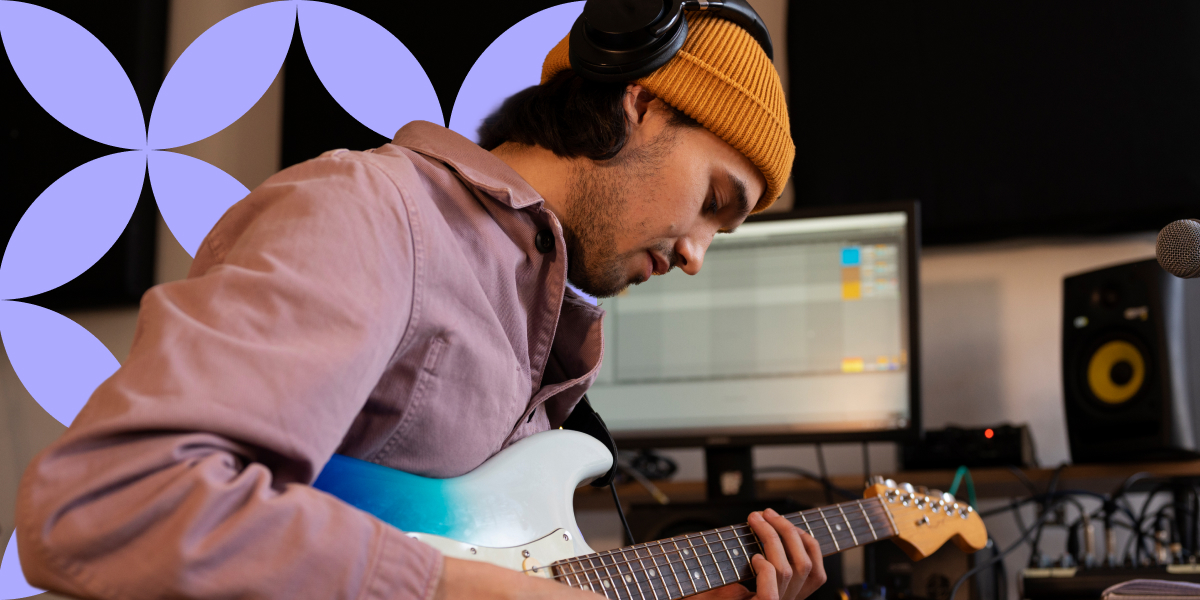 The main image presenting a man playing the guitar in front of a computer